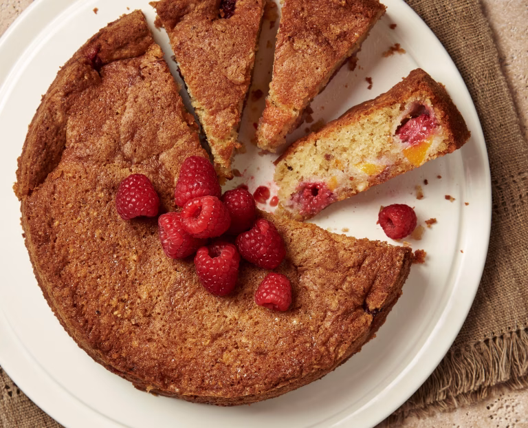 Raspberry Peach and Hazelnut Cake Photo by kitchengoodies.wordpress.com/