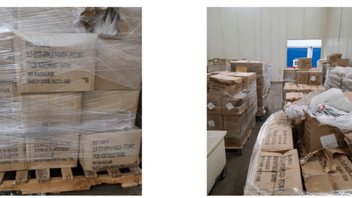 Damaged boxes of Red Tomato packaging sits in a warehouse